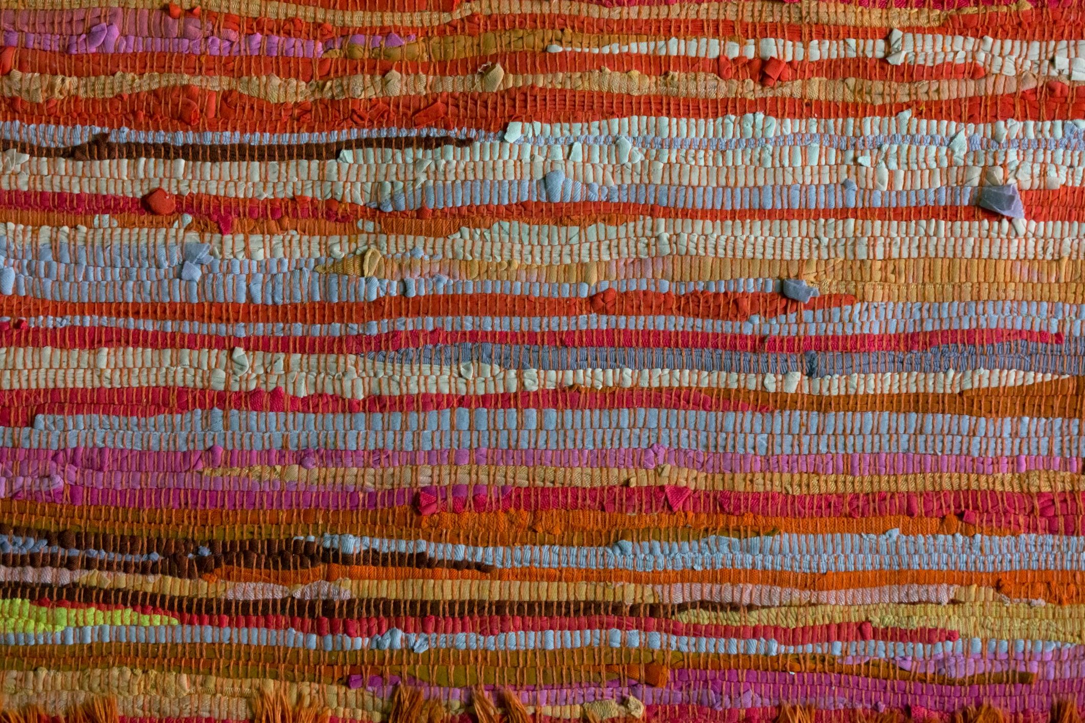 Textured woven textile in warm neutral colors